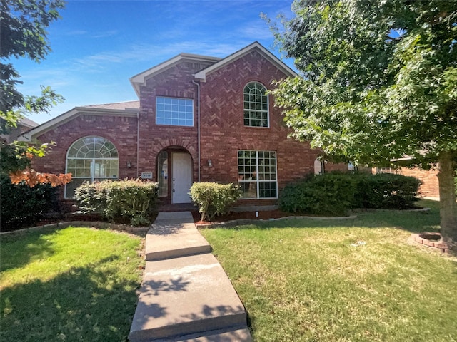 view of front of home featuring a front yard