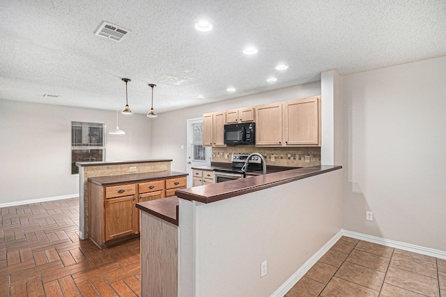 kitchen with a textured ceiling, decorative backsplash, decorative light fixtures, kitchen peninsula, and stainless steel range with electric cooktop