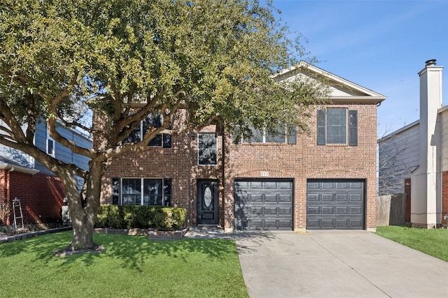 view of front facade featuring a garage and a front lawn