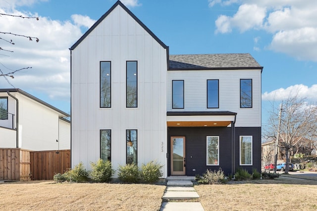 modern farmhouse with a front yard