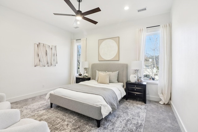 carpeted bedroom with ceiling fan