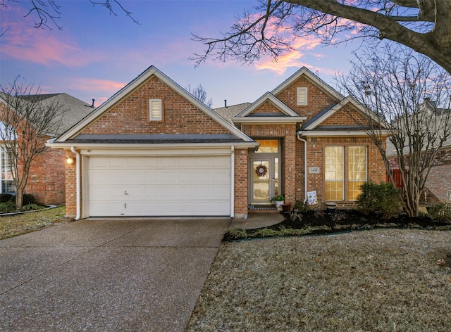 view of front of property with a garage