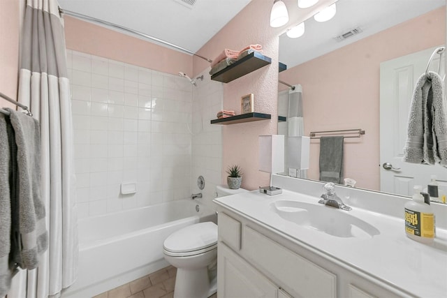 full bathroom featuring vanity, toilet, tile patterned floors, and shower / tub combo with curtain