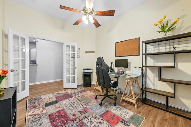 office space featuring hardwood / wood-style flooring, french doors, and ceiling fan