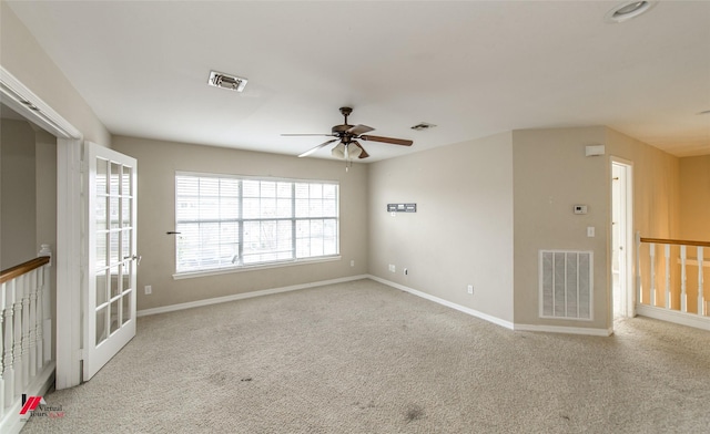 carpeted empty room with ceiling fan