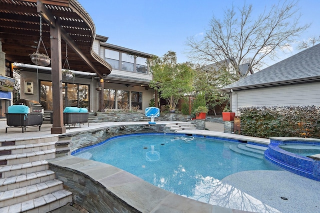 view of pool featuring an in ground hot tub, outdoor lounge area, a grill, and a patio