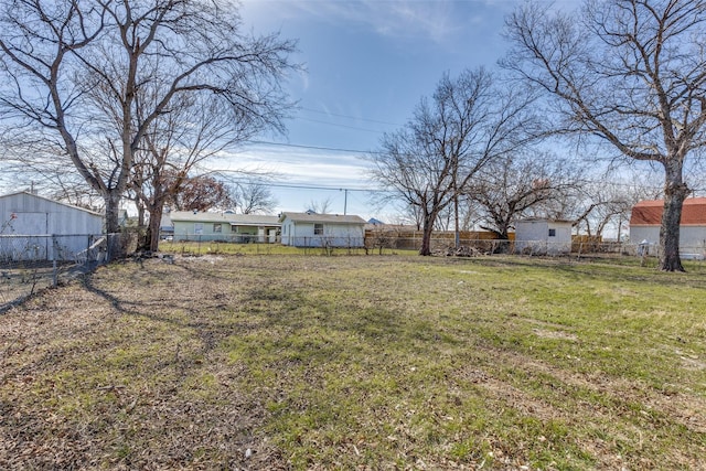 view of yard featuring fence