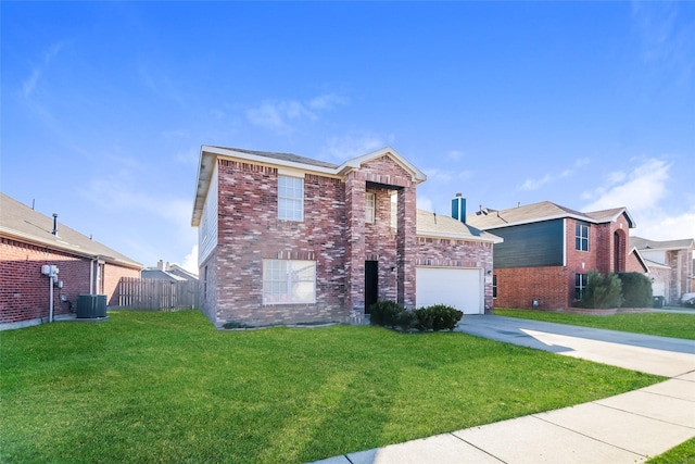 view of front of home with a garage, cooling unit, and a front lawn