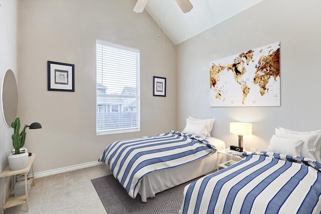 bedroom with carpet floors, ceiling fan, baseboards, and vaulted ceiling