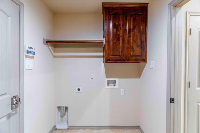 clothes washing area with washer hookup, gas dryer hookup, hookup for an electric dryer, and cabinets