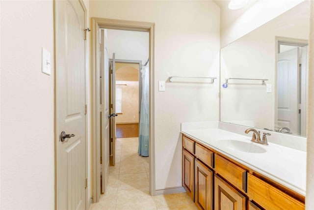 bathroom featuring tile patterned floors and vanity