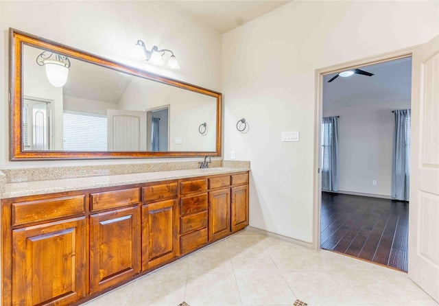 bathroom featuring tile patterned floors and vanity