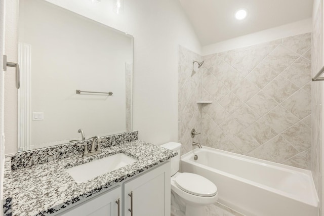 full bathroom featuring toilet, bathing tub / shower combination, and vanity