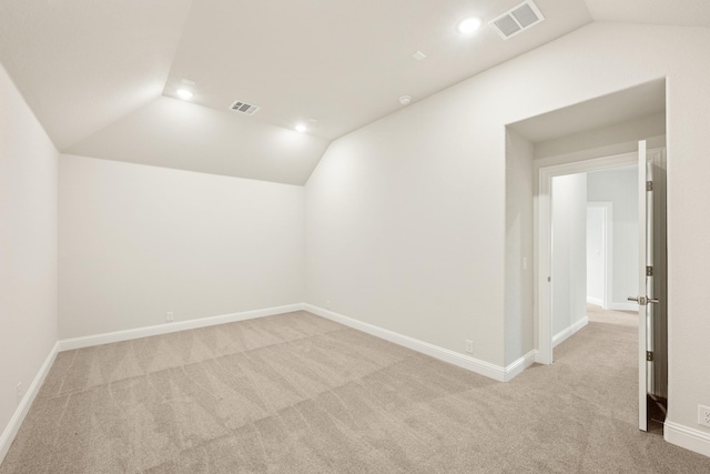 bonus room featuring visible vents, recessed lighting, carpet floors, and vaulted ceiling