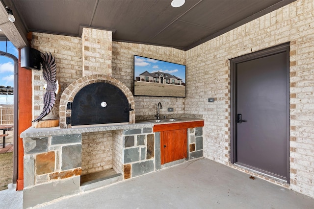 view of patio featuring sink