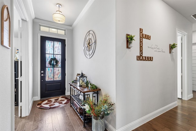 entryway featuring ornamental molding and dark wood-type flooring