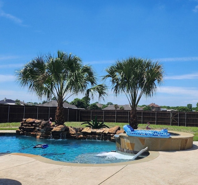 view of pool with fence and a fenced in pool