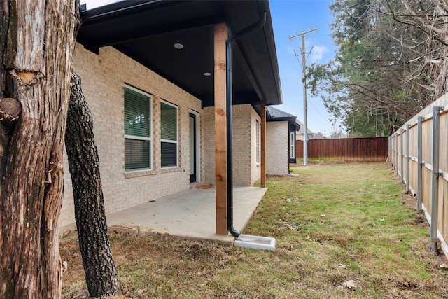 view of yard with a patio area