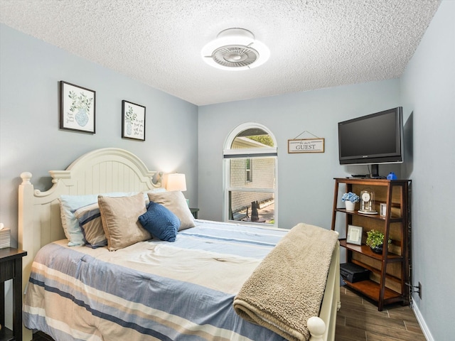 bedroom with a textured ceiling