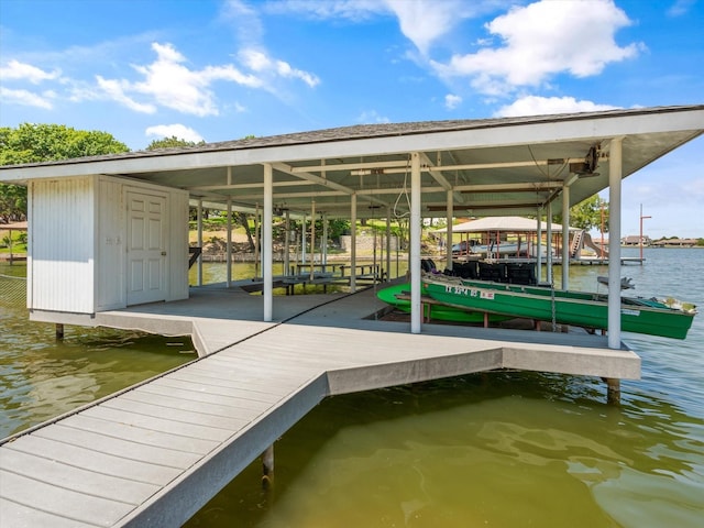 view of dock with a water view