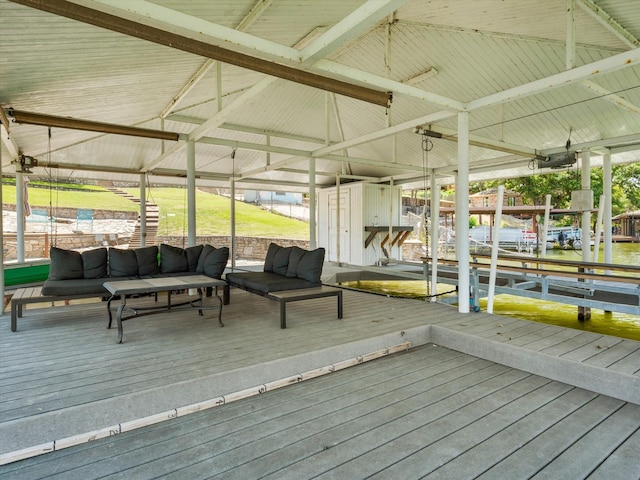 wooden deck featuring outdoor lounge area