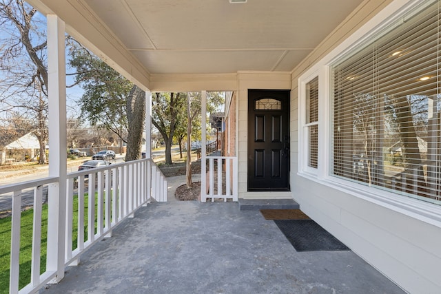 entrance to property with a porch