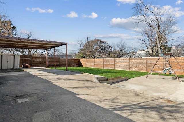 view of patio with a playground