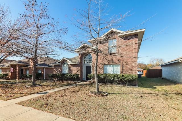 view of front property featuring a front yard