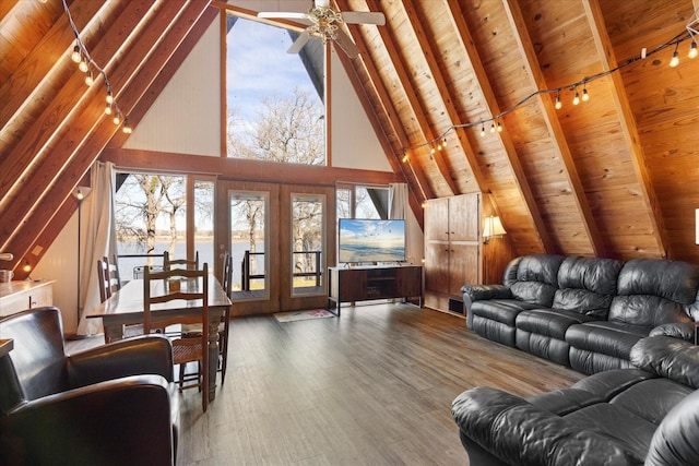 living room featuring wooden ceiling, hardwood / wood-style flooring, and beam ceiling