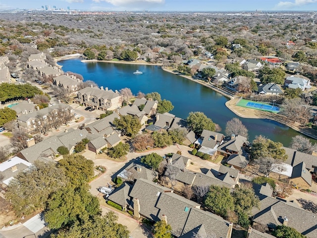 bird's eye view featuring a water view and a residential view