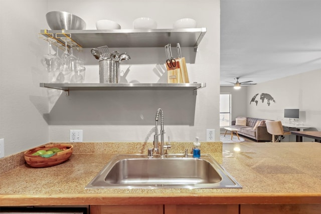 5111 Manett St Unit 103, Dallas, TX 75206 - kitchen featuring a sink, open shelves, a ceiling fan, open floor plan, and light countertops