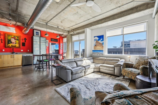 living room with sink and ceiling fan