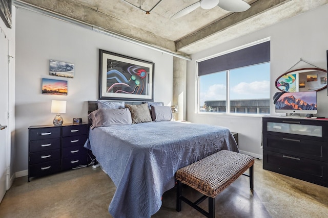 bedroom with ceiling fan and concrete floors