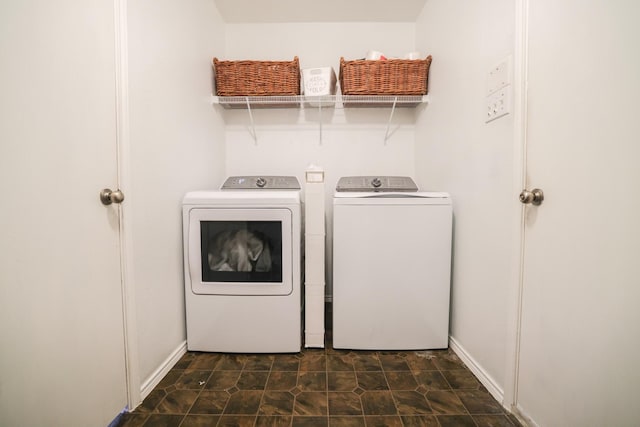 clothes washing area featuring washing machine and dryer