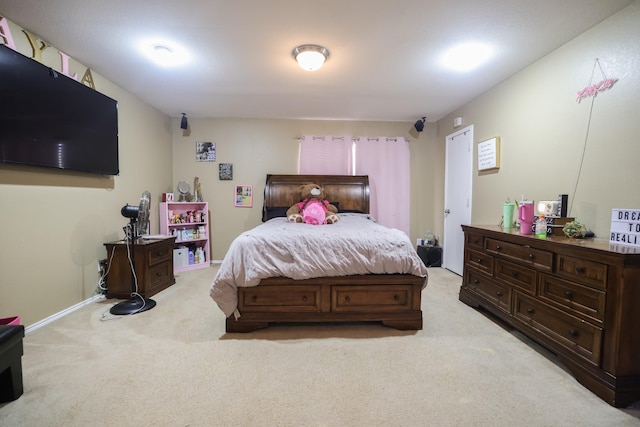 bedroom with light carpet