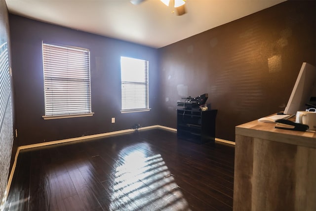 spare room with ceiling fan and dark hardwood / wood-style floors