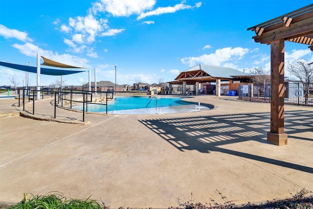 view of swimming pool with a patio and a gazebo