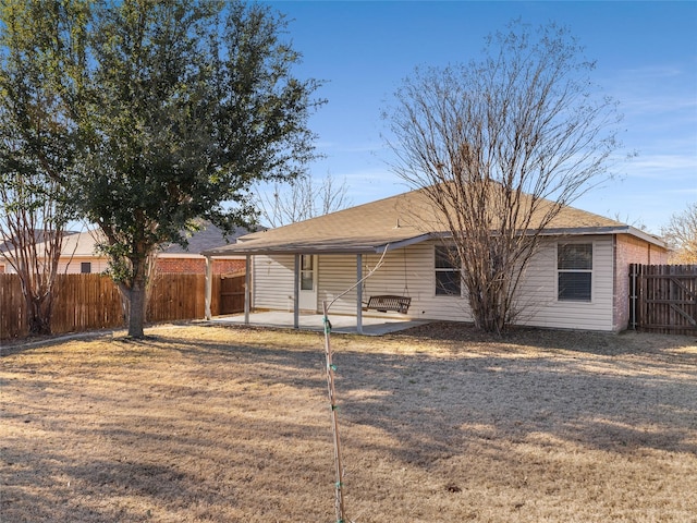 rear view of house with a patio area