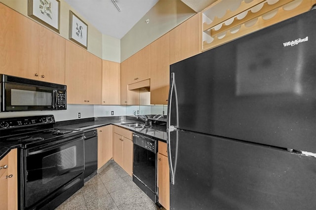 kitchen with sink, light brown cabinets, and black appliances