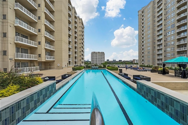 view of pool with a patio area