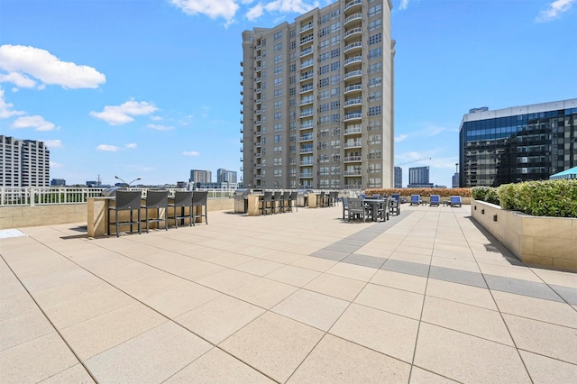 view of home's community with a patio