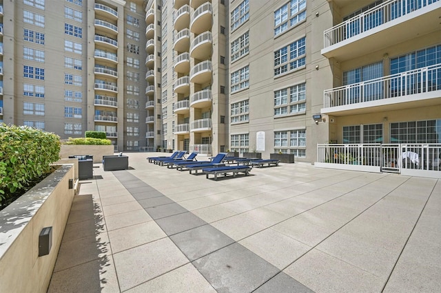 view of home's community featuring a patio area