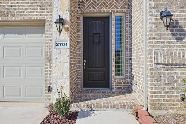 property entrance with a garage