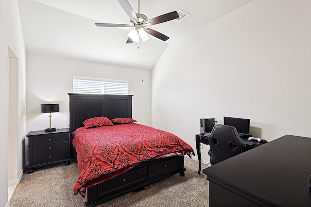 bedroom with ceiling fan, light colored carpet, and lofted ceiling