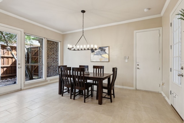 1151 Deer Lake Dr, Frisco, TX 75036 - dining space featuring a chandelier, ornamental molding, and baseboards