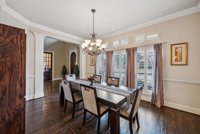 dining room featuring crown molding, a chandelier, and dark hardwood / wood-style flooring