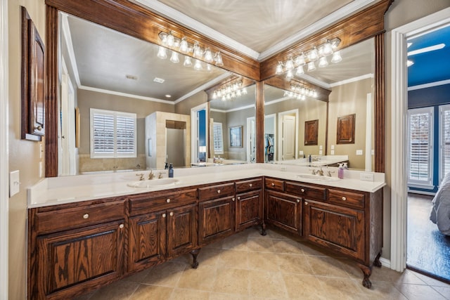 bathroom with vanity and ornamental molding