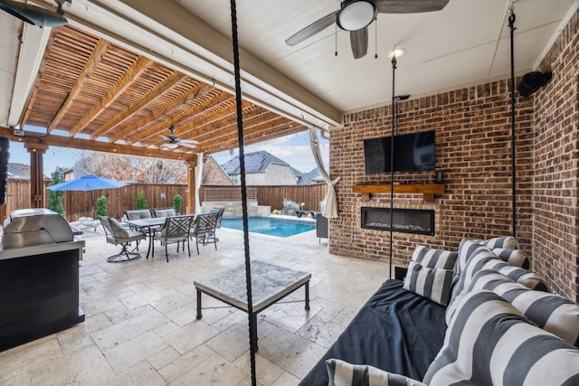 view of patio featuring a pergola, a fenced in pool, and an outdoor living space with a fireplace