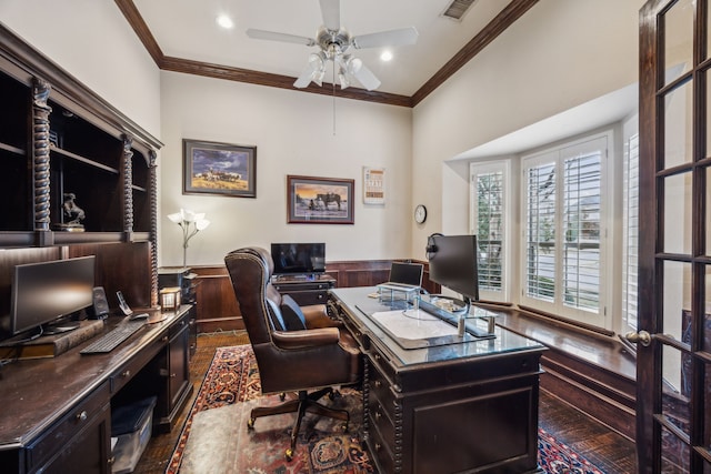 office space featuring ceiling fan, dark hardwood / wood-style flooring, crown molding, and wooden walls