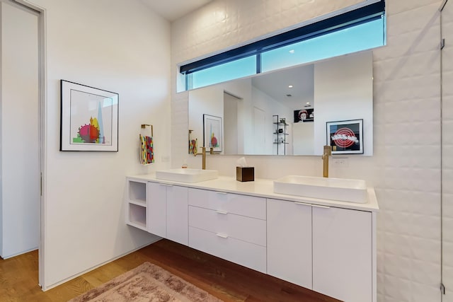 bathroom with vanity and hardwood / wood-style floors